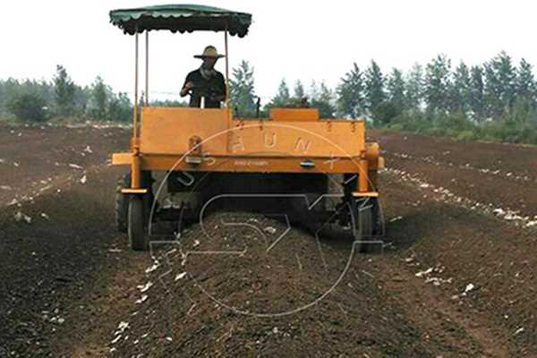 Moving type compost turner for biochar fertilizer compost